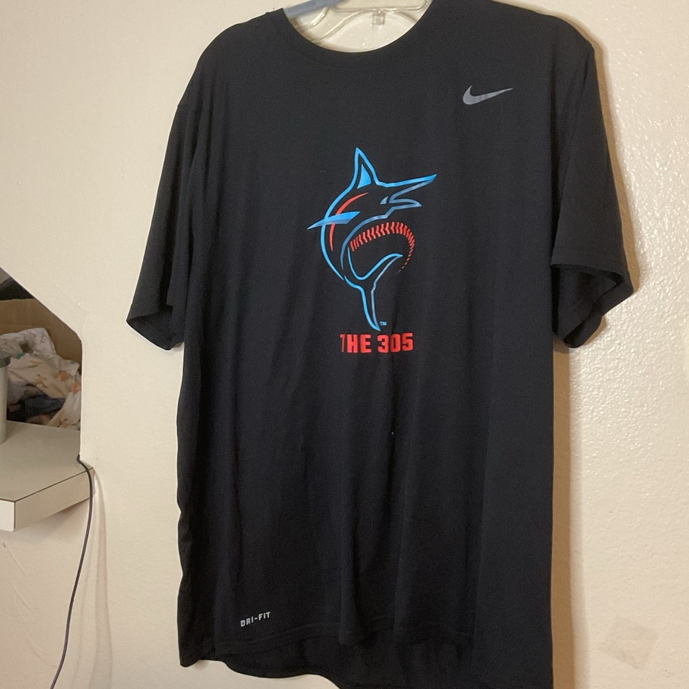 The nike Tee with Shark and Baseball Graphic